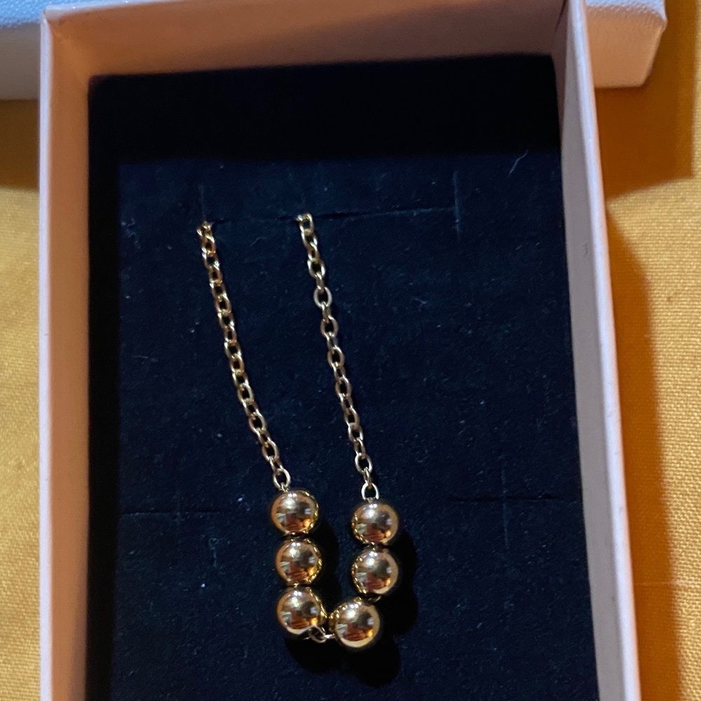 Elegant Gold Bead Necklace